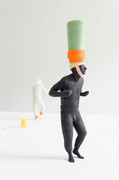 a toy figure with a hat on his head