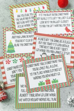 four christmas gift tags with candy canes next to them