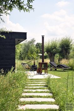 an outdoor patio with steps leading up to it