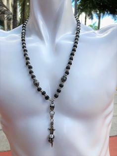 Rosary "Lava Energy" - ROS124 (has a matching Bracelet US$ 65.00 Bracelet is not included in the Rosary Price) Material: Lava Beads, Hematite, Surgical Steel Pendant (Skull) Weight: 90.9 gr. Width: 8mm Beads Length: 17" - Neck Length: 26" Designed and Handcrafted in house! Handmade Mens Rosary, 8mm Beads, Jewelry Men, Lava Beads, The Rosary, Matching Bracelet, Lava Bead, Mens Fashion Summer, Matching Bracelets