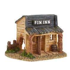 a small wooden building with a sign that says finnn