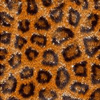 an animal print fabric with brown and black spots