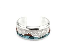 Ben Nighthorse-Mountains With Rock Art Bracelet by Ben Nighthorse-Sorrel Sky Gallery-Jewelry Western Style Bangle As Gift, Western Style Bangle Jewelry As Gift, Western Style Bangle Jewelry Gift, Artisan Turquoise Engraved Bracelets, Artisan Turquoise Engraved Bracelet, Western Style Blue Bangle Jewelry, Southwestern Style Blue Inlay Bracelets, Artisan Blue Bracelets Collectible, Artisan Engraved Blue Bracelets