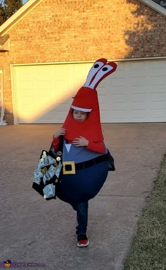 a little boy dressed up as a cartoon character