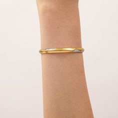 Select this eroded bangle bracelet for an effortless yet contemporary style, ideal for those who love a two-toned pattern fashioned into a subversive-basic design. Elevate your look with a casual and cool piece, perfect for any occasion.
Band Width: 5.5mm
Band Thickness: 3mm
Material: 18k Gold & Rhodium Plated Elegant Hammered Cuff Bracelet, Modern Hammered Bangle Bracelets, Elegant Formal Hammered Bangle, Modern Gold Bangle Diamond Bracelet, Modern Everyday Diamond Bangle Bracelet, Adjustable Tarnish Resistant Diamond Bangle Bracelet, Adjustable Tarnish-resistant Diamond Bangle Bracelet, Modern Twist Bangle As Gift, Modern Twist Yellow Gold Bangle Bracelet