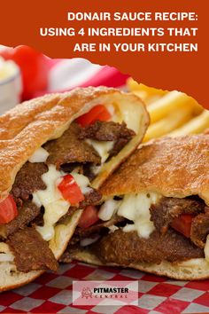 two sandwiches cut in half sitting on top of a red and white checkered table cloth