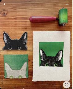 three different pictures on a wooden surface, one with a cat's head and the other with an animal's face