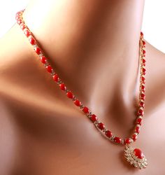 Stamped: 14K Yellow Gold Total Necklace Weight: 30.0 Grams Necklace Length: 17 Inches Necklace Width: N/A Gemstone Weight: Total Natural Center Coral Weight is 2.68 Carat (Measures: 12.10x9.06 mm) Color: Red Gemstone Weight: Total Natural Side Coral Weight is 42.44 Carat Color: Red Diamond Weight: Total Natural Diamond Weight is 3.30 Carat Color: F-G, Clarity: VS2-SI1 Face Measures: 26.90x24.17 mm Sku: [702678W] Formal Gold Bridal Necklace With Stones, Jeweled Yellow Gold Necklaces For Wedding, Yellow Gold Jeweled Necklace For Wedding, Jeweled Round Bridal Necklace For Formal Occasions, Formal Jeweled Bridal Necklace, Formal Bridal Necklace With Jewels, Jeweled Yellow Gold Necklace For Anniversary, Oval Stone Necklaces For Wedding, Jeweled Yellow Gold Necklaces For Anniversary