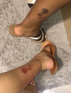 two people with tattoos on their feet and one has a rose tattooed on the ankle