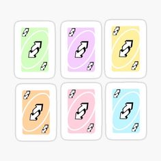 six stickers with different colors and shapes in the shape of an arrow, pointing up to