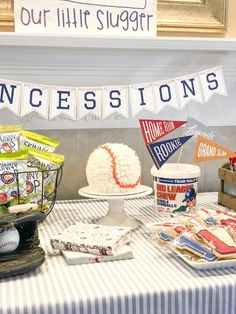 a table topped with lots of cakes and desserts next to a sign that reads, our little sluggy princess