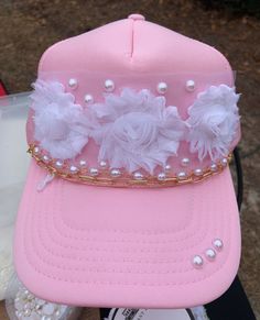 Hats are adjustable in the back and adult size. Otto hat brand. The hat chains are removable.  Product will be ready to ship out within a week of ordering. Pink Mini Baseball Cap For Parties, Pink Baseball Cap Mini Hats For Party, Trendy Party Trucker Hat For Spring, Trendy Spring Party Trucker Hat, Trendy Pink Party Baseball Cap, Spring Party Trucker Hat With Curved Brim, Pink Snapback Baseball Cap For Party, Pink Adjustable Baseball Cap For Party, Pink Baseball Cap For Party