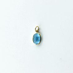 Material: 14k solid yellow gold (not gold plated or gold filled) Main Stone: Swiss Blue Topaz Main Stone Color: Blue Main Stone Shape: Oval Stone Size: 8x6 Carat Weight: 1.58 Carats Peridot Pendant, Blue Topaz Pendant, Sky Blue Topaz, Swiss Blue Topaz, Oval Stone, Charm Set, Pendant Set, Solid Yellow, Pink Sapphire