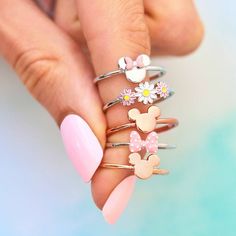 A dream is a wish your heart makes and we're totally dreaming about this Disney Minnie Mouse Delicate Ring! This dainty ring comes in a silver finish with a bitty Minnie Mouse head (pink bow included, obvi) and a delicate clear crystal for that Disney sparkle! - Brass base with rhodium plating, enamel & crystal stone- Minnie Mouse head dimensions: 6mm (H) x 6mm (W)- "Disney" and "Pura Vida" logos engraved on the inside of band Duck Ring, Mouse Jewelry, Disney Rings, Disney Engagement, Cheap Stuff, Turtle Ring, Minnie Mouse Bow, Pura Vida Bracelets, Simple Rose