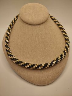 "22.5\" gold and black spiral designed beaded rope necklace. Can be customized to any color." Spiral Rope Beading, Adjustable Gold Spiral Necklace, Adjustable Spiral Gold Necklace, Black Adjustable Spiral Necklace, Adjustable Black Spiral Necklace, Rope Beading, Beaded Rope Necklace, Thread Chains, Alexandria Va