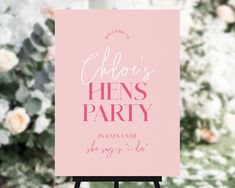 a pink sign with the words bachelor's hens party on it in front of flowers