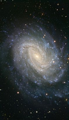 an image of a spiral galaxy in the sky