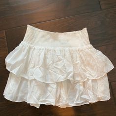 Beautiful Skirt Brand New Worn Once. Very Stretchy Material So Can Fit Bigger Than A Size Small Cheap White Skirt Urban Outfitters, White Ruffled Mini Skirt, White Ruffle Skirts Low Rise, Cream Ruffled Tiered Mini Skirt, Cheap Forever 21 Ruffled Mini Skirt, Ramy Brook, Princess Polly, Beautiful Skirts, Ruffle Skirt