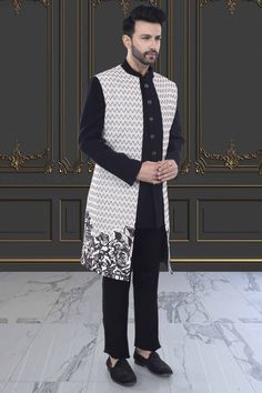 Introducing our R14-S76 Sherwani, a modern and elegant addition to your wardrobe. The unique floral design on the open jacket sherwani exudes sophistication and style. Elevate your look and make a statement with this premium piece. Elegant Long Sleeve Nehru Jacket For Designer Wear, Elegant Straight Kurta With Chikankari Embroidery, Elegant Festive Straight Kurta Outerwear, Elegant Outerwear With Chikankari Embroidery, Elegant Nehru Jacket For Designer Wear And Eid, Elegant Nehru Jacket For Eid Designer Wear, Elegant Fitted Straight Kurta Outerwear, Elegant Designer Outerwear For Eid, Elegant Designer Wear Sherwani With Straight Kurta