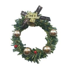 a christmas wreath with bells and decorations