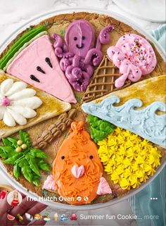 a cake decorated with different types of food