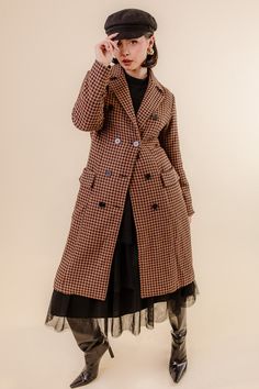 You didn't expect us to design just dresses, right? Meet our first official Ivy City Coat! The Tabitha Coat was designed to take your breath away with a beautiful houndstooth print, double breasted buttons, long sleeves, and a length that is to die for! SIZING TIP: These coats are running snug. We recommend sizing up 1-2 sizes to wear with sweaters. For a better fit, measure yourself and compare your measurements to the size chart. *Please note: For sizes XL to 5X, there is added length making t Tailored Plaid Outerwear With Double Button Closure, Tailored Double-breasted Houndstooth Outerwear, Brown Double-breasted Outerwear For Office, Double-breasted Houndstooth Outerwear For Business, Brown Houndstooth Outerwear For Winter, Double-breasted Wool Houndstooth Outerwear, Brown Houndstooth Winter Outerwear, Wool Double-breasted Houndstooth Outerwear, Brown Wool Coat For Office In Fall