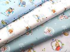 several different types of fabric with animals on them