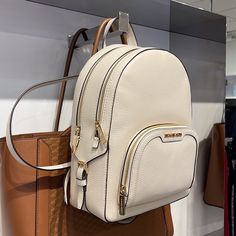 Michael Kors Jaycee Medium Logo Backpack Light Cream Pebbled Leather And Gilded Accents Come Together On Our Jaycee Backpacka Timeless Essential That’s Destined To Become Your New Hands-Free Favorite. It Features A Front Zip Pocket For Convenient Access, And Plenty Of Room Inside To Store Your Laptop And Other Necessities. Backpack Pebbled Leather 100% Leather Trim: 60% Polyurethane /20% Polyester/20% Cotton Gold-Tone Hardware 8.75”W X 12”H X 4.25”D Exterior Details: Front Zip Pocket Interior De Michael Kors Backpack With Removable Pouch, White Backpack For Shopping, Luxury Michael Kors Backpack With Detachable Strap, Michael Kors Leather Backpack For Errands, Michael Kors Backpack With Detachable Strap, Michael Kors Backpack With Detachable Strap For Daily Use, Leather Backpack With Gold-tone Hardware For Errands, Michael Kors Backpack With Gold-tone Hardware For Everyday Use, Michael Kors Everyday Backpack With Gold-tone Hardware