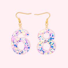 pair of earrings with multicolored sequins and gold tone earwires