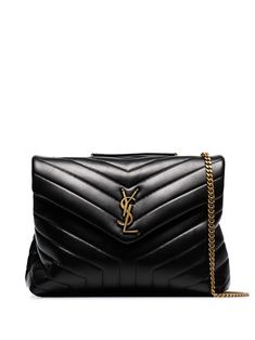 Saint Laurent shoulder bag in chevron-quilted leather. Chain and leather shoulder straps. Flap top with snap closure. Exterior, metallic YSL logo medallion. Interior, zip pocket. Made in Italy. Sac Yves Saint Laurent, Quilted Shoulder Bag, Medium Handbags, S Monogram, Shoulder Bag Black, Saint Laurent Bag, Quilted Leather, Medium Bags, Chain Bags