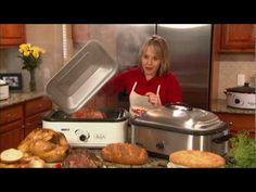 a woman in a kitchen with many food items