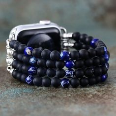 Ever felt the need to blend the ageless allure with the futuristic flair of your Apple Watch? Introducing our Onyx Beaded Bracelet Apple Watch Band – where the deep, enigmatic vibes of onyx stones dance with the shiny sleekness of your watch. Features: Mystical Allure: Onyx isn't just a stone; it's centuries of whispered secrets and age-old tales wrapped around your wrist. Handcrafted Magic: Our artisans don’t just make bands, they weave enchantment. Feel the magic with every handpicked onyx bea Bracelet Apple Watch Band, Faces Band, Apple Smartwatch, Cool Man, Beaded Watches, Smart Watch Apple, Moon Dance, Punk Aesthetic, Bracelet Apple Watch