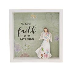 an angel figurine in a white frame with flowers and words on the side