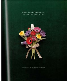 an open book with flowers on the cover