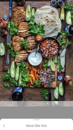 an overhead view of food on a table with the text more like this above it