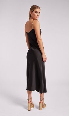 Go for a wow moment with the Monica. Crafted with soft satin in a maxi silhouette, this flowy dress features sleek chain straps that give it the perfect edge. Style with heels and gold jewelry and you'll be the best dressed guest at your next wedding or cocktail party. Product Fit & Details 100% Polyester Professional dry clean True to Size Style: SP24666-1 Model Size & FitModel wears a size XSModel wears: UK 6/ EU 34/ US 2Model's height: 177cm/5'10” Fit Details, Satin Maxi, Satin Maxi Dress, Best Dressed, Flowy Dress, Be The Best, Black Maxi Dress, Dresses Xs, Chain Strap