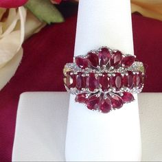 Genuine Faceted Oval, Marquee, And Pear Shaped African Ruby Ring ( 4.81 Cts ) Enhanced By Faceted Round Cambodian Zircon ( 0.19 Ct ) Set In Platinum Over 925 Sterling Silver. Nwot. Total 5.00 Cts. Est Retail $ 875. It Measures Approximately 3/4" L (North And South) And Side To Side ( East To West) Measurement Is 15/16" Red Ruby Diamond Multi-stone Ring, Red Ruby Multi-stone Ring With Diamonds, Cluster Red Multi-stone Ruby Ring, Cluster Red Ruby Ring With Multi-stones, Cluster Ruby Ring With Diamonds, Red Cluster Diamond Jewelry, White Ruby Ring With Diamond Accents, Red Cluster Fine Jewelry, Red Multi-stone Diamond Jewelry