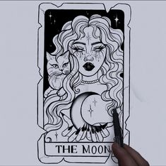 a drawing of a woman with cats on her face and the moon above her head