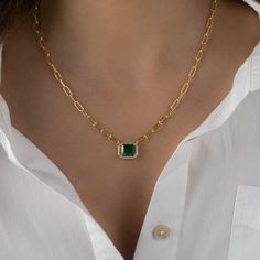 Make a statement with this stunning necklace! Featuring an emerald pendant and paperclip chain. It will instantly transform your outfit! 14k Gold or Rhodium plated brass - we use a THICK plating of 14k Gold and Rhodium for a piece that will be with you for years to come! Emerald Stone: 8x10mm 16" + 3" Ext Nickel-free & Hypoallergenic Lobster clasp Closure Necklace on Model: Tiny Bezel Necklace, Simple Beaded Necklace Elegant Green Cable Chain Necklace, Elegant Green Necklace With Paperclip Chain, Green Link Chain Necklace As Gift, Green Link Chain Necklace Gift, Green Link Chain Necklace For Gifts, Everyday Green Chain Jewelry, Everyday Green Jewelry With Chain, Gold Emerald Necklace, Emerald Pendant Necklace