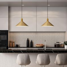 three stools sit in front of the kitchen counter