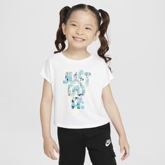 Made of drapey poly/viscose jersey that feels soft and light, this tee is fresh style for little athletes. It has a tagless crewneck for easy wear, the short dolman sleeves add to the relaxed feel and the roomy cut flows with little ones as they play. Nike Sports T-shirt For Spring, White Sporty Cropped T-shirt For Spring, Spring Sports T-shirt Pre-shrunk, Playful Sports T-shirt For Summer, Nike Summer Graphic Tee T-shirt, Nike Summer Graphic Tee, White Moisture-wicking T-shirt For Spring, Nike Athleisure T-shirt For Spring, Nike Spring Athleisure T-shirt