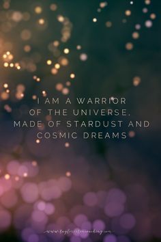 a blurry photo with the words i am a warrior of the universe, made of stardust and cosmic dreams