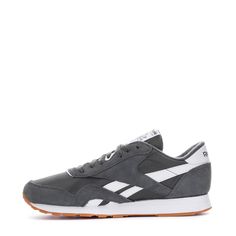 Wherever your day leads, these men's Reebok Classic Nylon shoes are your stylish companion. True to their 1991 origins, they feature a sleek nylon upper with plush suede overlays, offering a confident design that effortlessly pairs with any outfit in your wardrobe. Features: A classic '90s sneaker with modern comfort. Padded foam sockliner for all-day cushioning. The textile lining feels like a second sock on the inside. Details: Classic laces. Upper: Suede and nylon. Midsole: EVA. Outsole: Rubb Sporty Gray Sneakers With Rubber Toe Cap, Gray Nylon Sneakers With Round Toe, Gray Nylon Round Toe Sneakers, Gray Sneakers With Rubber Toe Cap For Streetwear, Gray Nylon Sneakers For Streetwear, 90s Sneakers, Kicks Shoes, White Kicks, Adidas Tee