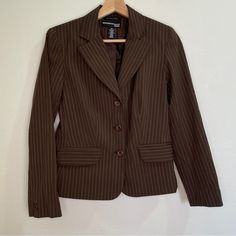 Norton Mcnaughton Petites Stretch Striped Blazer - Brown Nwot. 76% Polyester, 22% Rayon, And 2% Spandex. Milk Chocolate Brown With Alternating Off White And Peach Dotted Stripes. Fully Lined. Three Buttons Closure. Buttoned Cuffs. Two Flap Pockets On The Front That Have Not Been Opened. Shoulder Pads. Notch Collar. Suit Vent That Has Not Been Opened. Long Sleeve. Measurements Are Shown In The Pictures. Not A Posh Member? Enter My Referral Code Pre_adored When You Join And Receive A $10 Credit. School Blazer, Dark Grey Blazer, Checkered Blazer, Holloween Costume, Tan Blazer, Brown Blazer, Brown Suits, Grey Blazer, Vintage Blazer