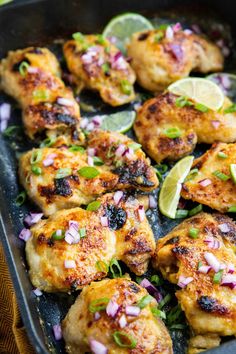 chicken with limes and onions in a pan