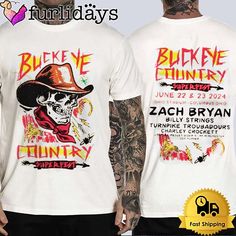 Zach Bryan Tour 2024 Buckeye Country Superfest Merch Skully Unisex T-Shirt Not only provides a soft and breathable feel every time you wear it but also showcases a sophisticated and diverse style. With its classic unisex design, our T-shirt complements various fashion styles, from casual to elegant. Add versatility and style to your wardrobe with this T-shirt    Tailored for the trendsetting individual inspired by: Photos Of Zach Bryan Tour 2024 Buckeye Country Superfest Merch Skully U Summer Crew Neck T-shirt For Country Concerts, White Band Merch T-shirt For Country Concerts, Screen Print T-shirt For Summer Country Concerts, Summer Band Merch T-shirt For Fans, Summer T-shirt With Screen Print For Country Concerts, Summer Band Merchandise T-shirt, Graphic Tee T-shirt For Country Festivals, Short Sleeve Graphic Tee For Country Festivals, Crew Neck T-shirt For Country Concerts And Festivals