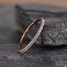 Rose Gold London Blue Topaz Wedding Band Half Eternity Diamond Band Women Stackable Ring Minimalist Delicate Matching Dainty Bridal Promise ITEM INFORMATION: Metal Type- Solid 14K Rose Gold Ring Size Available- US3# -10# *Wedding Band Details: WIDTH-( approx. 1.4mm) Stone - Natural London Blue Topaz Weight - 0.18ct **Stone Replacement** Available with any other gemstones, please feel free to contact me for a quote. **Metal Type** Available in 14K or 18K yellow gold, white gold, and rose gold. Pl Elegant Blue Topaz Half Eternity Jewelry, Sapphire Gemstone Eternity Band Wedding Ring, Sapphire Gemstone Eternity Band For Wedding, Elegant Blue Topaz Stackable Wedding Rings, Elegant Wedding Eternity Band With Birthstone, Light Blue Cubic Zirconia Wedding Ring, Blue Minimalist Stackable Wedding Rings, Minimalist Blue Stackable Wedding Rings, Elegant Stackable Topaz Wedding Ring