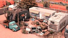 an aerial view of a trailer home and rv park in the desert, with cars parked nearby