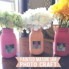 painted mason jar photo craft with flowers in it