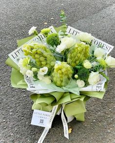 a bouquet of flowers sitting on the ground